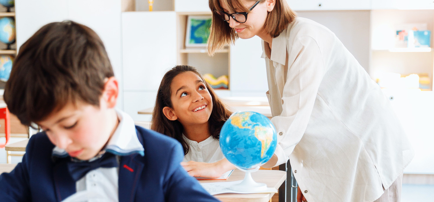 student looking up at teacher